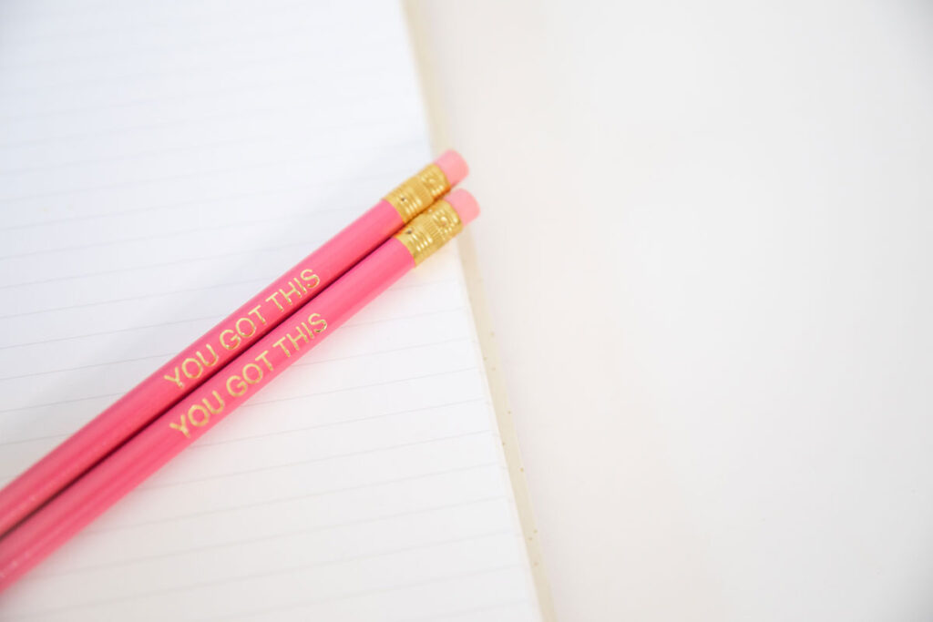 two pink pencils with the words "you got this" engraved on them