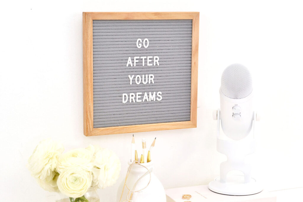 A letter board with the words go after your dreams on it.