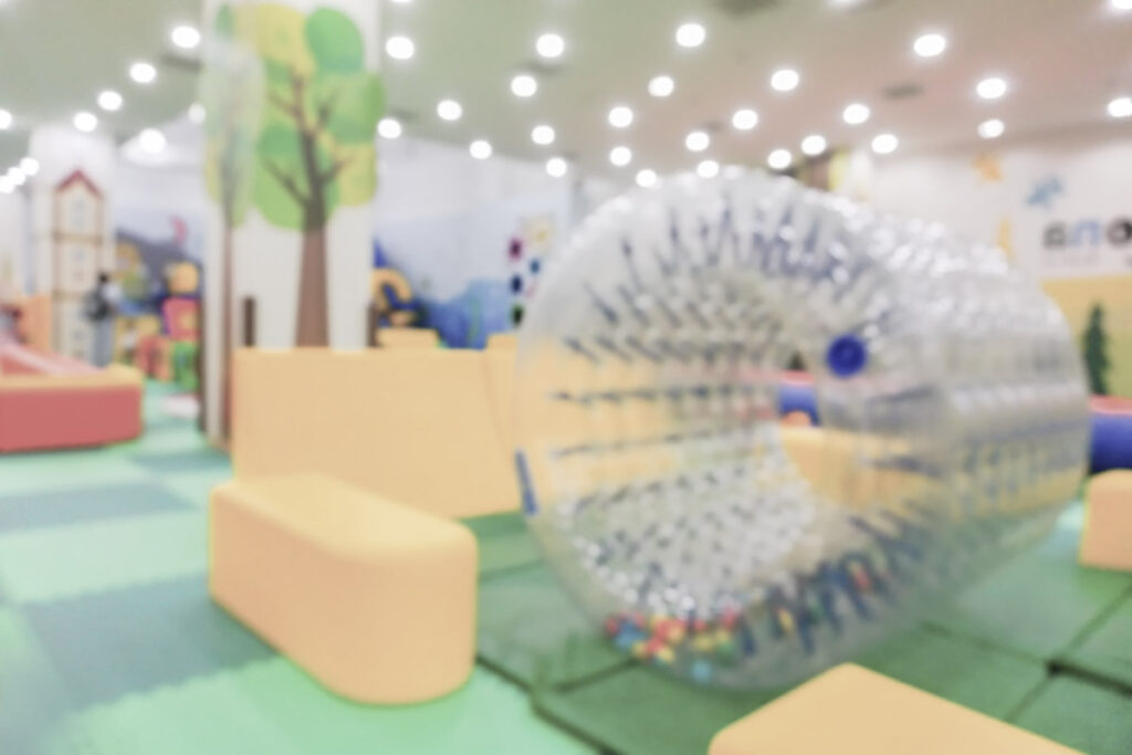 blurred image of indoor playground for kids